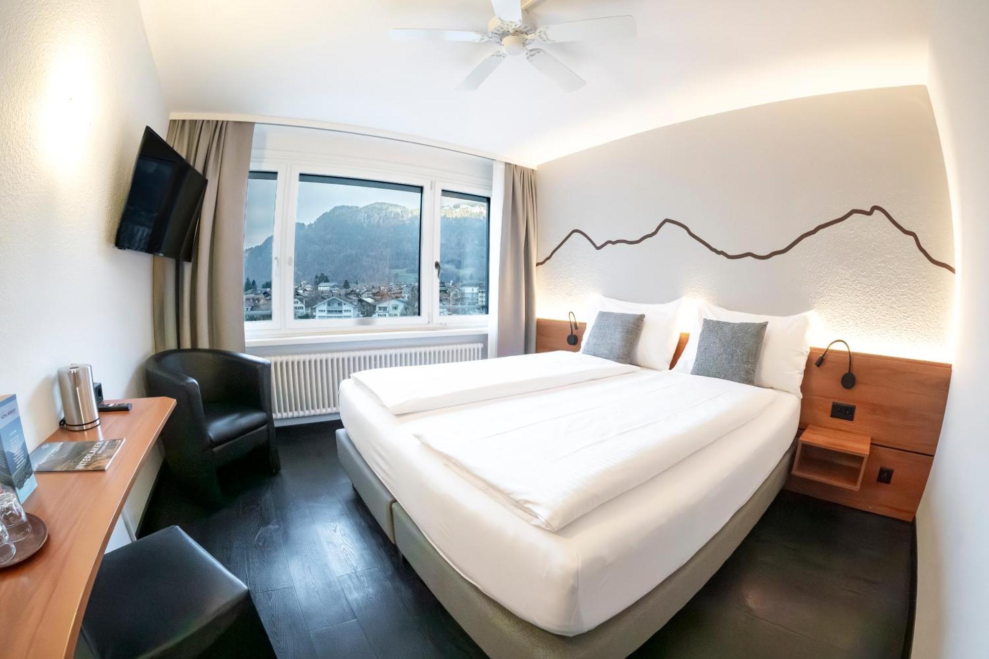 Hotel Merkur - West Station Interlaken Buitenkant foto